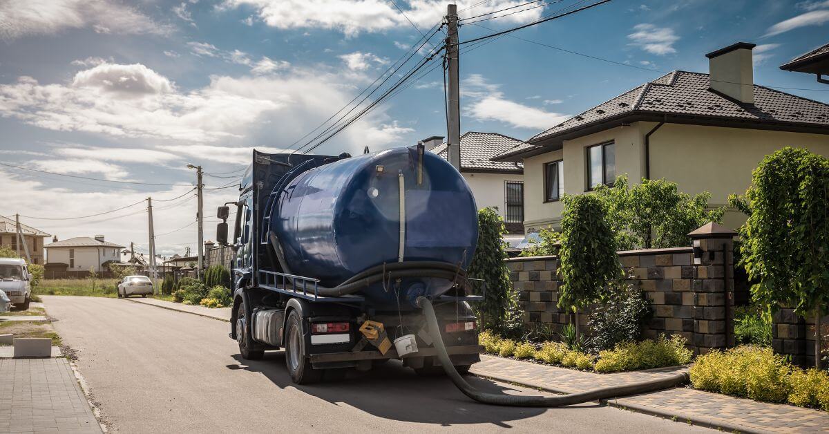 A truck cleaning Sewer line from a home